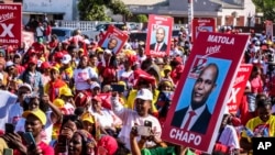 Supporters take part in a ruling party rally to support presidential candidate Daniel Chapo ahead of elections, in Maputo, Mozambique, Oct. 6, 2024.