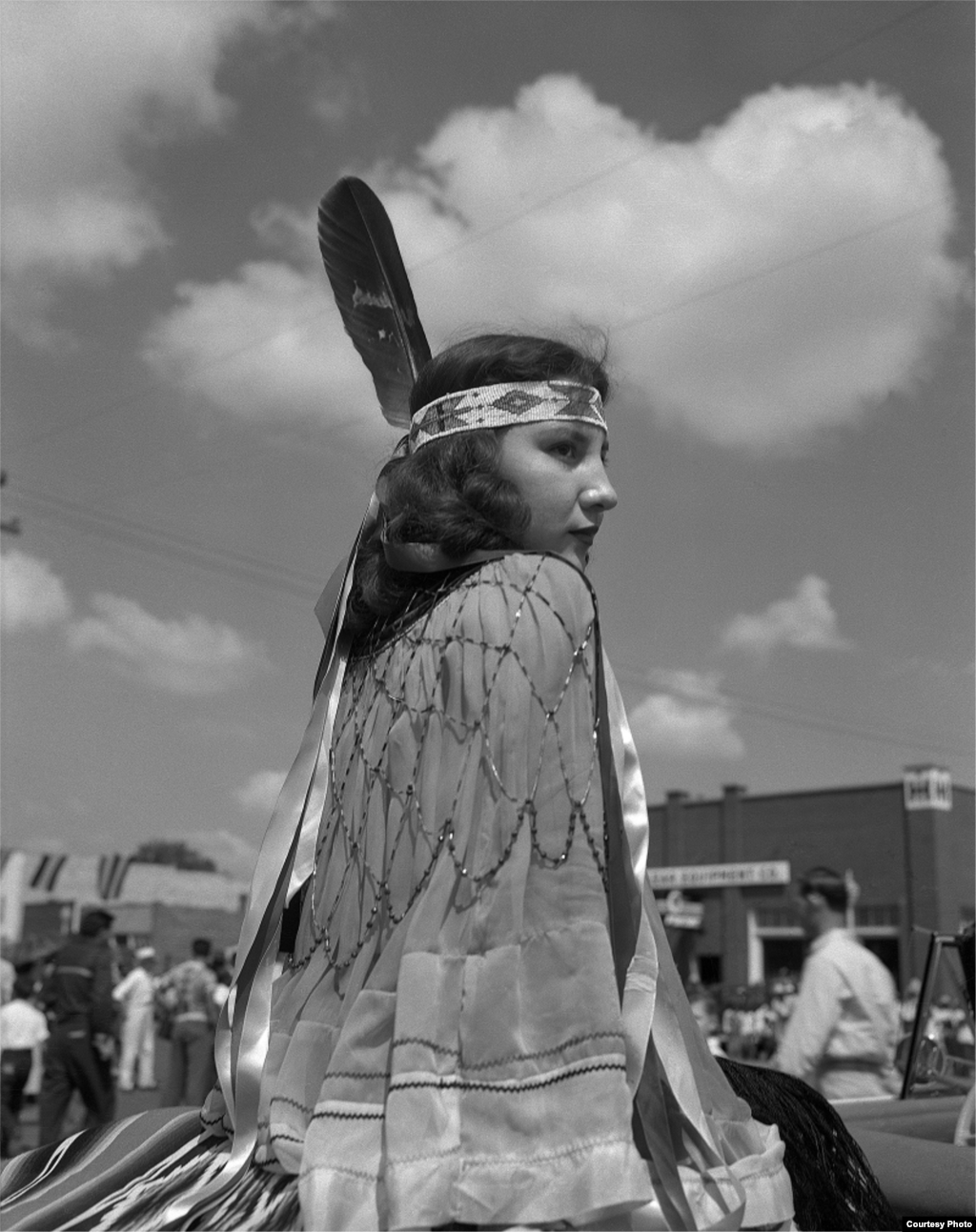 Eula Mae Narcomey Doonkeen (Seminole) in the American Indian Exposition Parade. Andarko, Oklahoma, ca. 1952. 45EXCW6. © 2014 Estate of Horace Poolaw. Reprinted with permission.