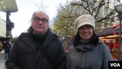 Ulrich Mueller, left, believes Schengen should continue, but controls on the EU border should be increased. (A. Tanzeem/VOA)