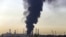 A plume of smoke rises up from a main oil refinery south of Tehran, Iran, June 3, 2021. 