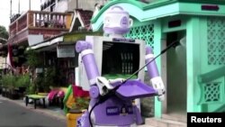 The 'Delta robot' was designed by university lecturers and local residents who built it from old household items. (Reuters Photo)