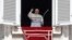 Pope Francis recites the Angelus noon prayer from the window of his studio overlooking St.Peter's Square, at the Vatican, Sept. 2, 2018. 