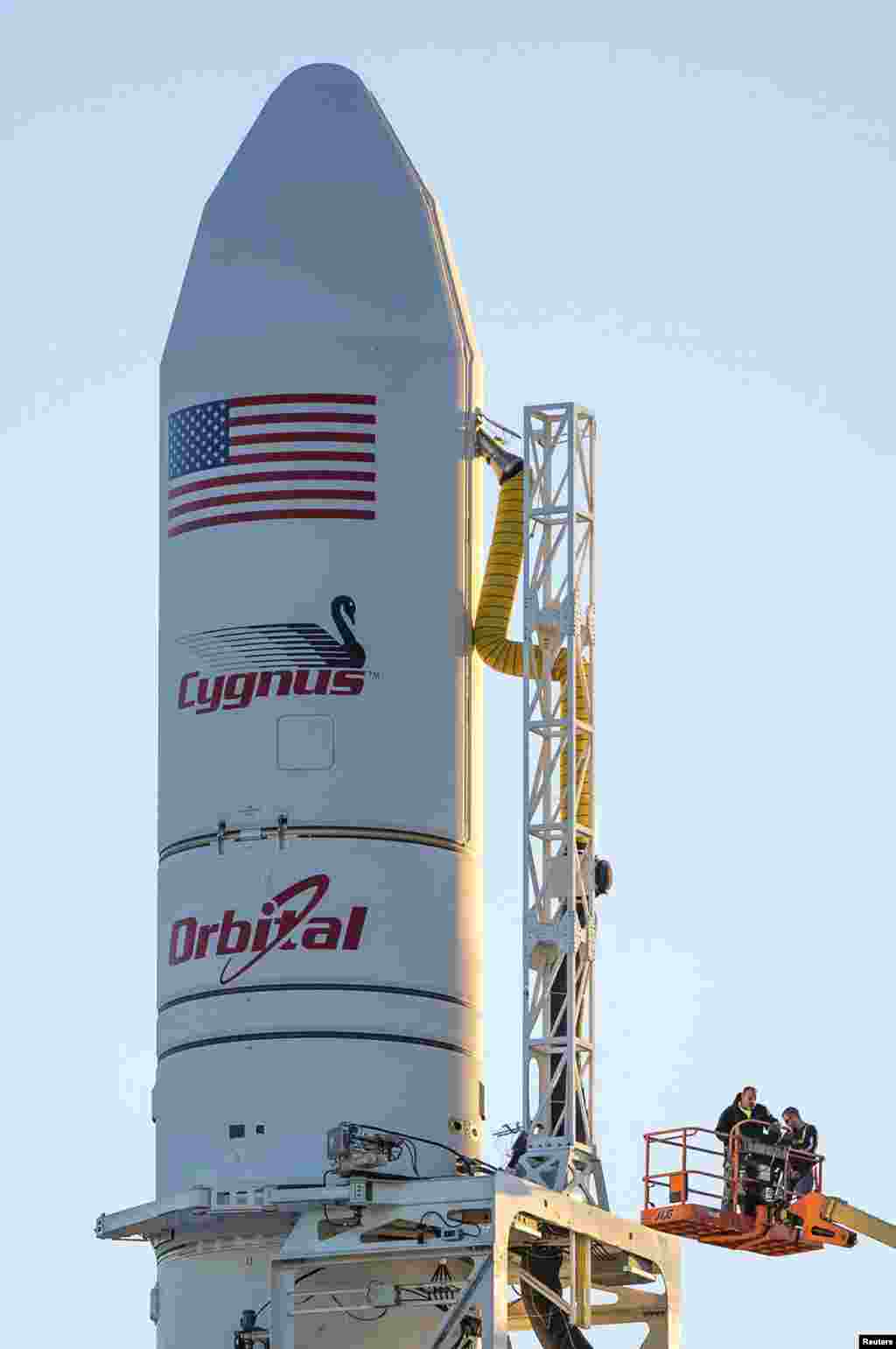 Orbital Sciences Corporation&#39;s Antares rocket and Cygnus cargo spacecraft are prepared for launch at the Mid-Atlantic Regional Spaceport on Wallops Island, Virginia in this NASA handout picture released Oct. 27, 2014. 