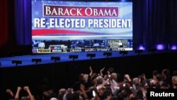 Supporters of U.S. President Barack Obama cheer the news of the president's apparent re-election during his election night rally in Chicago, November 6, 2012. REUTERS/Jeff Haynes (UNITED STATES - Tags: POLITICS ELECTIONS USA PRESIDENTIAL ELECTION) 