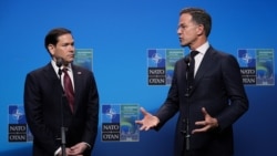 Marco Rubio, left, and Mark Rutte deliver a statement during a meeting of NATO foreign ministers in Sweden, Friday, May 22, 2026. 