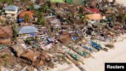 Aerial view of damaged coastal houses in wake of Typhoon Haiyan, Iloilo Province, central Philippines, Nov. 9, 2013.