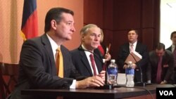 Republican presidential candidate Sen. Ted Cruz, R-Texas, left, and Texas Gov. Greg Abbott, speak about the resettlement of Syrian refugees in the U.S., during their joint news conference on Capitol Hill in Washington, Dec. 8, 2015 (VOA/ M. Bowman).