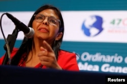 FILE - Delcy Rodriguez speaks during a news conference on the sidelines of the OAS 47th General Assembly in Cancun, Mexico, June 20, 2017.