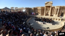 Russian conductor Valery Gergiyev leads a concert in the amphitheater of the ancient city of Palmyra in May 2016.