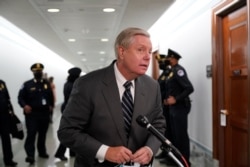 Committee Chairman Sen. Lindsey Graham, R-S.C., speaks to the media during a break in the confirmation hearing for Supreme Court nominee Amy Coney Barrett, before the Senate Judiciary Committee, on Capitol Hill, Oct. 12, 2020.