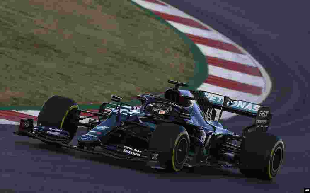 Mercedes driver Lewis Hamilton of Britain steers his car during the first practice session prior to the Formula One Portuguese Grand Prix at the Algarve International Circuit in Portimao, Portugal, Friday, Oct. 23, 2020. The Formula One Portuguese Grand P