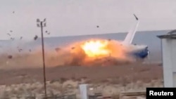 An Azerbaijan Airlines passenger plane crashes near Aktau, Kazakhstan, on Dec. 25, 2024, in this image from video. (Social media via Reuters)