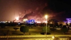Smoke is seen following a fire at an Aramco factory in Abqaiq, Saudi Arabia, Sept. 14, 2019.