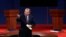 This Oct. 3, 2012 file photo shows moderator Jim Lehrer addressing the audience before the first presidential debate at the University of Denver in Denver. 
