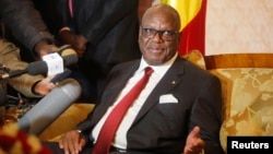 FILE: Mali's President Ibrahim Boubacar Keita announced a cease-fire Friday. He's shown at a press conference Jan. 18, 2014.