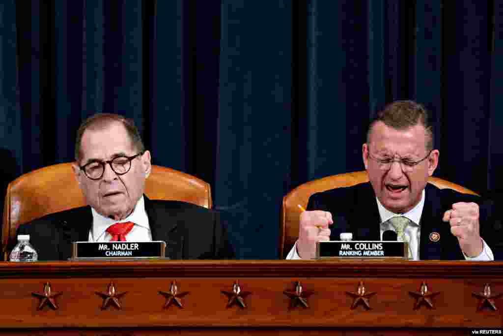 House Judiciary Committee ranking member Rep. Doug Collins, R-Ga., speaks as chairman Rep. Jerry Nadler, D-N.Y., listens during a markup of the articles of impeachment against President Donald Trump, on Capitol Hill in Washington.