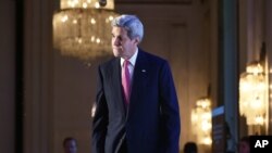 El secretario de Estado de EE.UU., John Kerry, expresó optimismo por la reunión de grupos rebeldes sirios, al margen de la conferencia de la ONU sobre el clima en París, el jueves, 10 de diciembre de 2015.