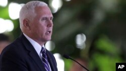 U.S. Vice President Mike Pence delivers a statement at the Itamaraty Palace, in Brasilia, Brazil, June 26, 2018. 