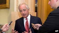 FILE - Senate Foreign Relations Committee Chairman Sen. Bob Corker, R-Tenn., talks with reporters on Capitol Hill in Washington, Oct. 20, 2015.