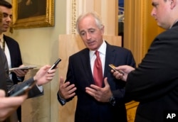 FILE - Senate Foreign Relations Committee Chairman Bob Corker, R-Tenn., talks with reporters on Capitol Hill in Washington, Oct. 20, 2015. Corker said Thursday that he looked forward "to continuing our work to hold Tehran accountable."