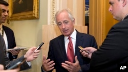 FILE - Senate Foreign Relations Committee Chairman Sen. Bob Corker, R-Tenn., talks with reporters on Capitol Hill in Washington, Oct. 20, 2015. 