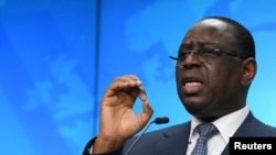 FILE: Senegal's President Macky Sall speaks at a news conference on the second day of a European Union (EU) African Union (AU) summit at The European Council Building in Brussels, Belgium February 18, 2022.