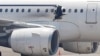索马里机场人员因飞机爆炸受到审讯