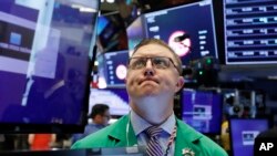 El operador Ryan Falvey en la Bolsa de Valores de Nueva York, el jueves 9 de mayo de 2019. Las pérdidas en los mercados bursátiles de EE.UU. han entrado en su segunda semana a causa de una disputa comercial con China.