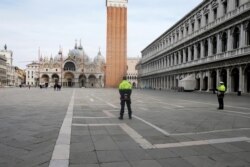 The almost empty St. Mark?s Square is seen after the Italian government imposed a virtual lockdown on the north of Italy including Venice to try to contain a coronavirus outbreak, in Venice, Italy, March 9, 2020.