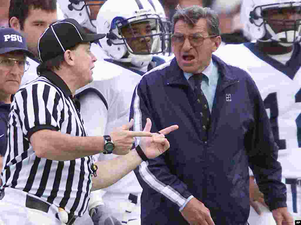 Penn State head caoch Joe Paterno yells at officials after his team was penalized for clipping against the University of Wisconsin in the fourth quarter at Camp Randall Stadium in Madison, Wisconsin. The Badgers were defeated by Penn State 34-31, October 