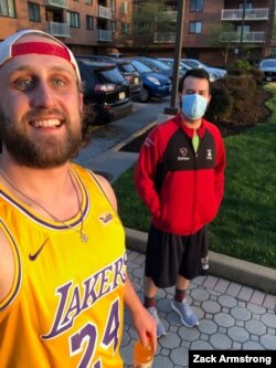 Zach Armstrong and Francis Wilson take their first walk outside together since Francis arrived home from the hospital. They kept a safe 6 feet apart, since Francis' health remained fragile for the first week.