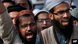 Pakistani students of Islamic seminaries chant slogans during a rally in support of blasphemy laws, in Islamabad, Pakistan, March 8, 2017. This week three bloggers were ordered held while blasphemy charges are being investigated. 