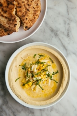 The Louisiana blue crab hummus at Chef Alon Shaya's New Orleans restaurant, Saba, adds local seafood to a traditionally Mediterranean dish. (Photo courtesy of Saba.)