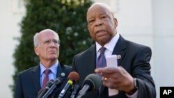 Rep. Elijah Cummings, D-Md., accompanied by Rep. Peter Welch, D-Vt., speaks to members of the media outside the West Wing of the White House in Washington, March 8, 2107, following their meeting with President Donald Trump.