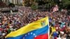 Des partisans de l'opposition participent à un rassemblement contre le gouvernement du président vénézuélien Nicolas Maduro et à la commémoration du 61e anniversaire de la fin de la dictature de Marcos Perez Jimenez à Caracas (Venezuela), le 23 janvier 2019. REUTERS / Carlos Garc