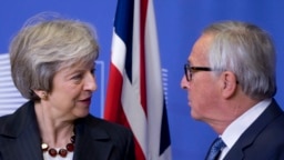 Thủ tướng Anh Theresa May và Chủ tịch Ủy ban châu Âu Jean-Claude Juncker i