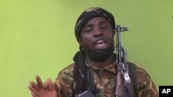 Abubakar Shekau, chef du groupe Boko Haram au Nigeria, délivre un message filmé, 22 mai 2014. 