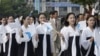 FILE - North Korea's female cheerleaders, including a woman (right) believed to be North Korean leader Kim Jong-Un's current wife Ri Sol-Ju, attend the 2005 Asian Athletics Championships in Incheon.