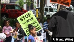 Protesters gather before a march and rally in Baltimore, May 2, 2015.