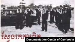 Democratic Kampuchea leaders and members of the Standing Committee of the Central Commitee of the Communist Party of Kampuchea (CPK). Facing foward from the left, Pol Pot, CPK Secretary and Prime Minister of Democratic Kampuchea, Nuon Chea, Deputy Secretary of the CPK and DK President of the People Representative Assembly, Ieng Sary, Deputy Prime Minister for Foreign Affairs, Son Sen, Deputy Prime Minister for Defense, and Vorn Vet, Deputy Prime Minister for Economy, in 1977. The photo was taken by a Khmer Rouge photographer (name is unknow), at Pochentong Intetnational Airport, Phnom Penh. (Documentation Center of Cambodia Archives) 