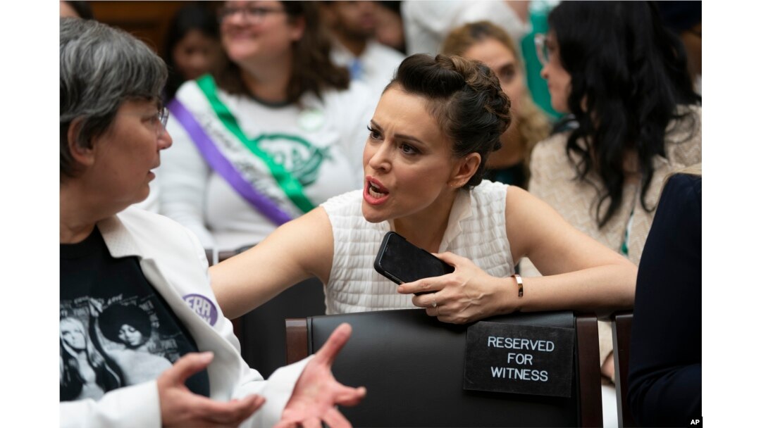 Actress and activist Alyssa Milano joins supporters of the Equal Rights Amendment at a House Judiciary Committee hearing on Capitol Hill in Washington, April 30, 2019.