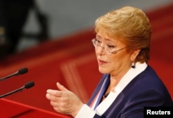 FILE - Chile's President Michelle Bachelet delivers the last speech of her presidential mandate to the nation at the national congress building ahead of the next presidential election, in Valparaiso, June 1, 2017.