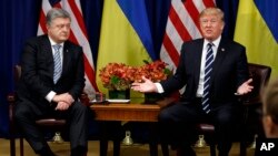 President Donald Trump, right, meets with Ukraine's President Petro Poroshenko at the Palace Hotel during the United Nations General Assembly, Sept. 21, 2017, in New York. 