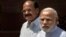 Indian PM Narendra Modi, right, talks to media upon his arrival at the parliament house as Venkaiah Naidu stands along in New Delhi, India, April 25, 2016.