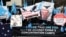 FILE - Uighurs and their supporters rally across the street from United Nations headquarters in New York, Thursday, March 15, 2018. Members of the Uighur Muslim ethnic group held demonstrations in cities around the world on Thursday to protest a sweeping Chinese surveillance and security campaign that has sent thousands of their people into detention and political indoctrination centers. (AP Photo/Seth Wenig) Uighurs and their supporters rally across the street from United Nations headquarters in New York, March 15, 2018, to protest a sweeping Chinese surveillance and security campaign that has sent thousands of their people into detention and political indoctrination centers.