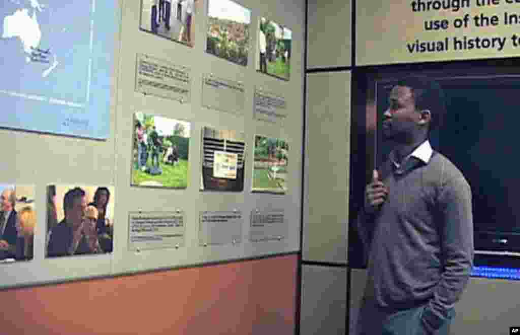 Yves Kamuromsi - only 13 when the Rwandan genocide occurred - now heads the documentation center at the Kigali Genocide Memorial Center in Rwanda, and said sharing the experience with other survivors helps everyone, November 2011.