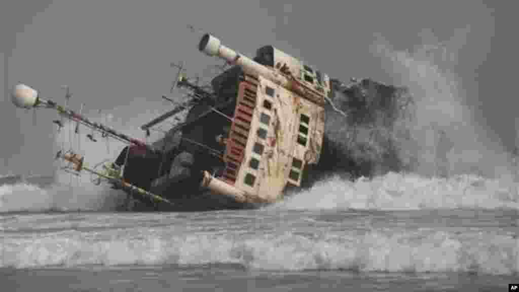 An abandoned ship is beached on the coastline in Nigeria.