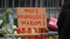 Belgians Ask: 'Why Us?'