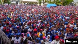 FILE - Supporters of the leader of Liberia's ruling party Coalition for Democratic Change , President and former soccer player George Weah, attend to his final campaign rally for the presidential elections in Monrovia, Liberia October 8, 2023.