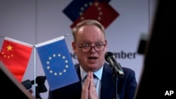 President of the European Union Chamber of Commerce in China Jens Eskelund gestures as he speaks during a press conference for the annual European Business in China Position Paper, in Beijing, Sept. 11, 2024. 